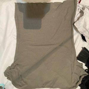 Green shirt with open v cut in the front. Lettuce short sleeve.